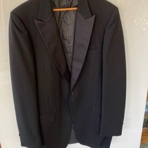 Men like new black TUXADO JACKET with black satin lapels, three front pockets